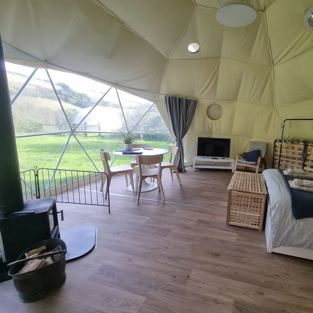 Inside Seren dome with log burner Inside Seren dome with log burner